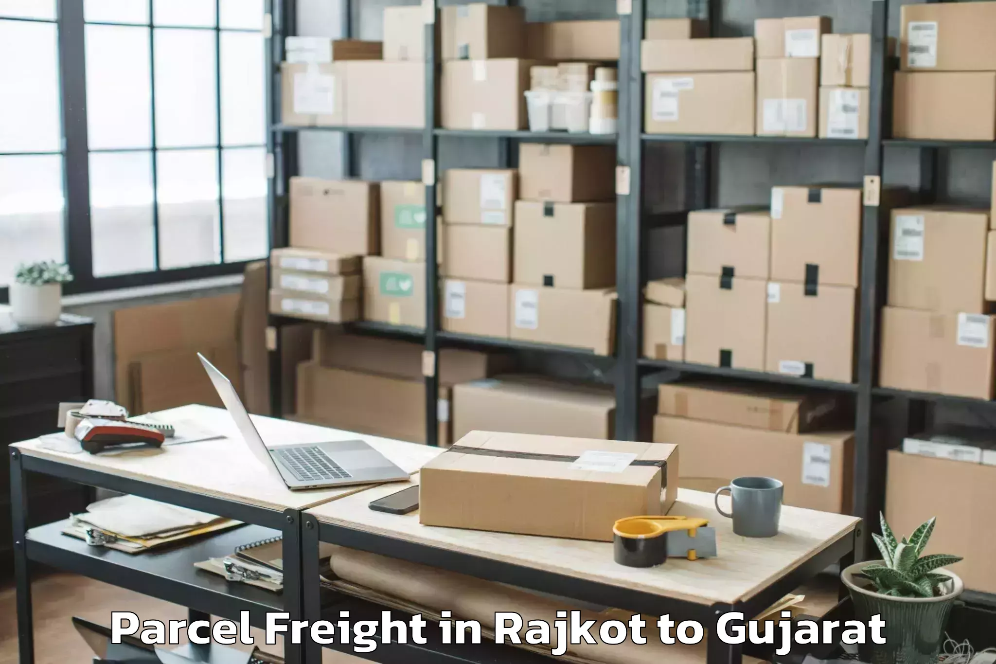 Easy Rajkot to Sankheda Parcel Freight Booking